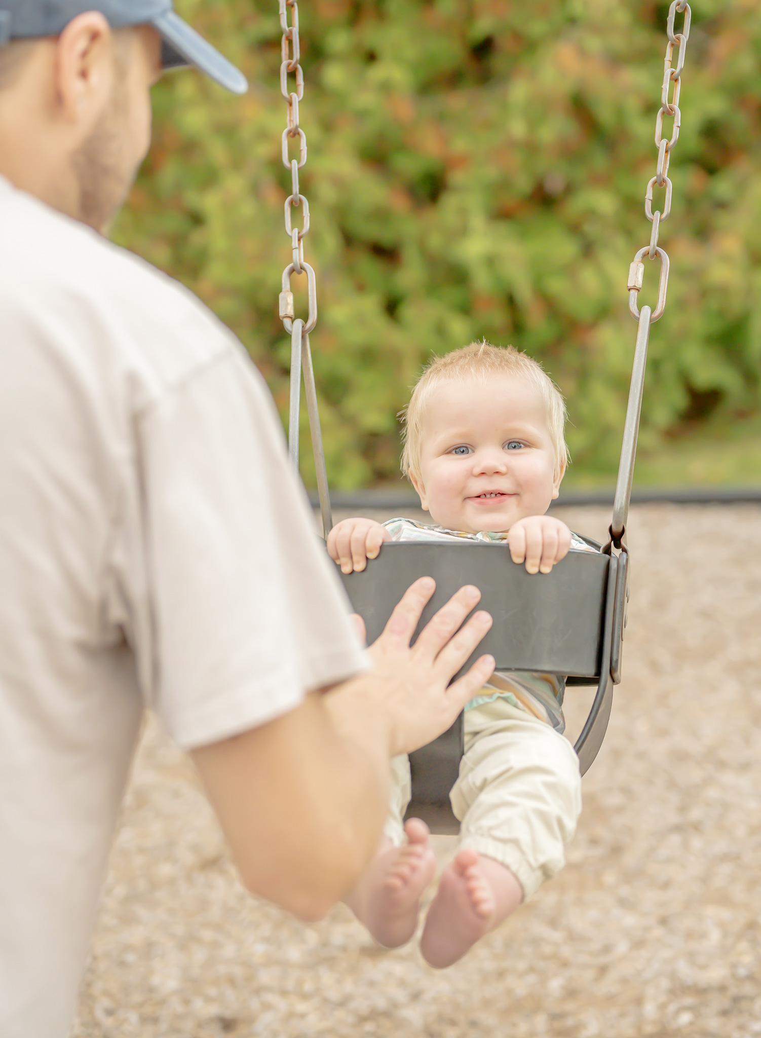 Lifestyle dad and me family session featuring toddler playing with his dad.