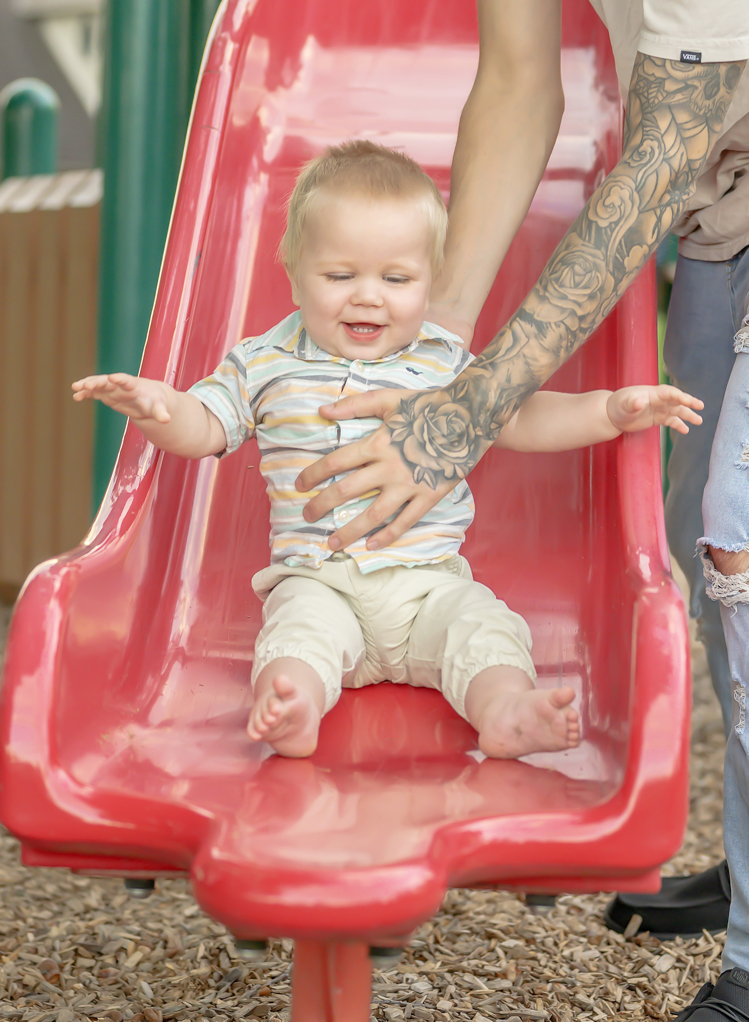 Toddler session with dad in a Niagara region playground.