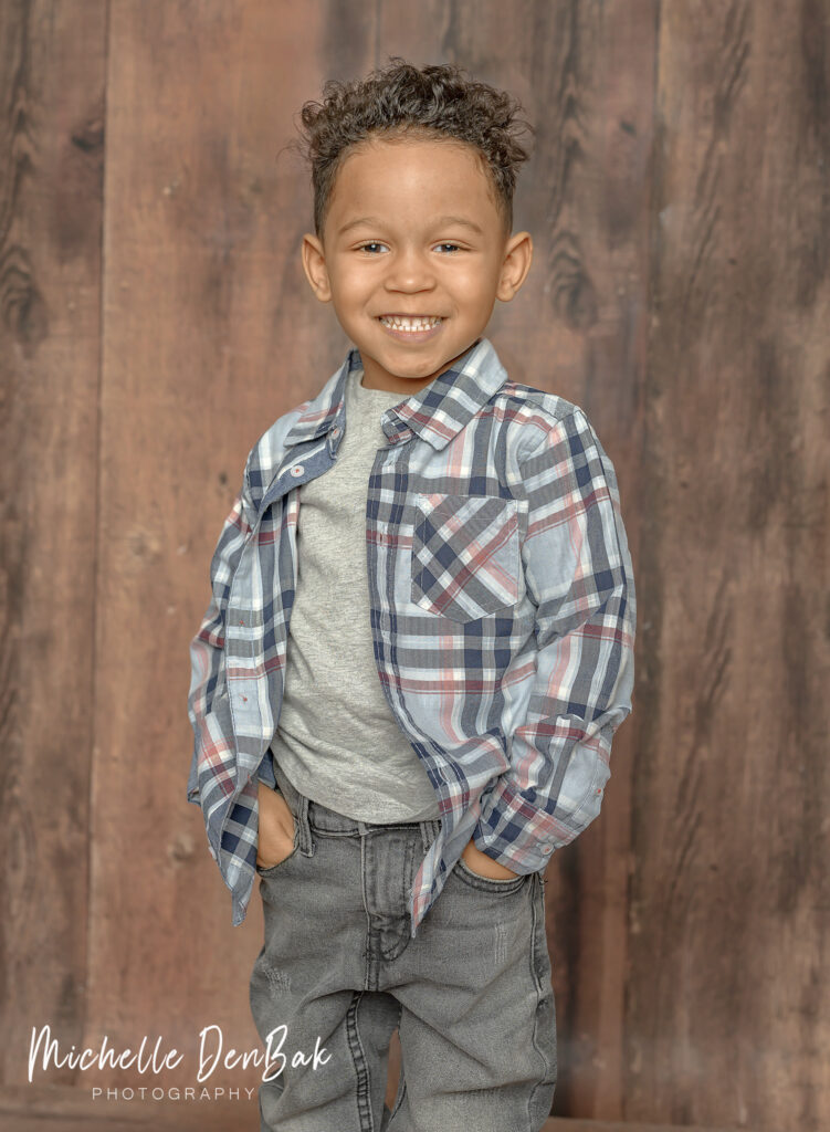Milestone portrait of young child smiling naturally