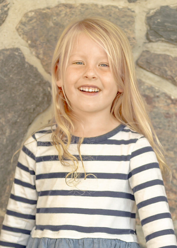 Milestone portrait of young child during an outdoor session at Charles Daley Park.