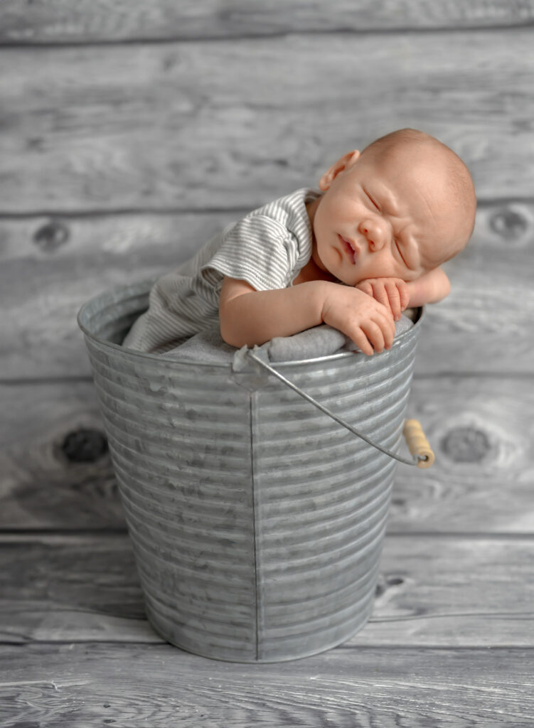 Newborn baby boy sleeping during St. Catharines photo session