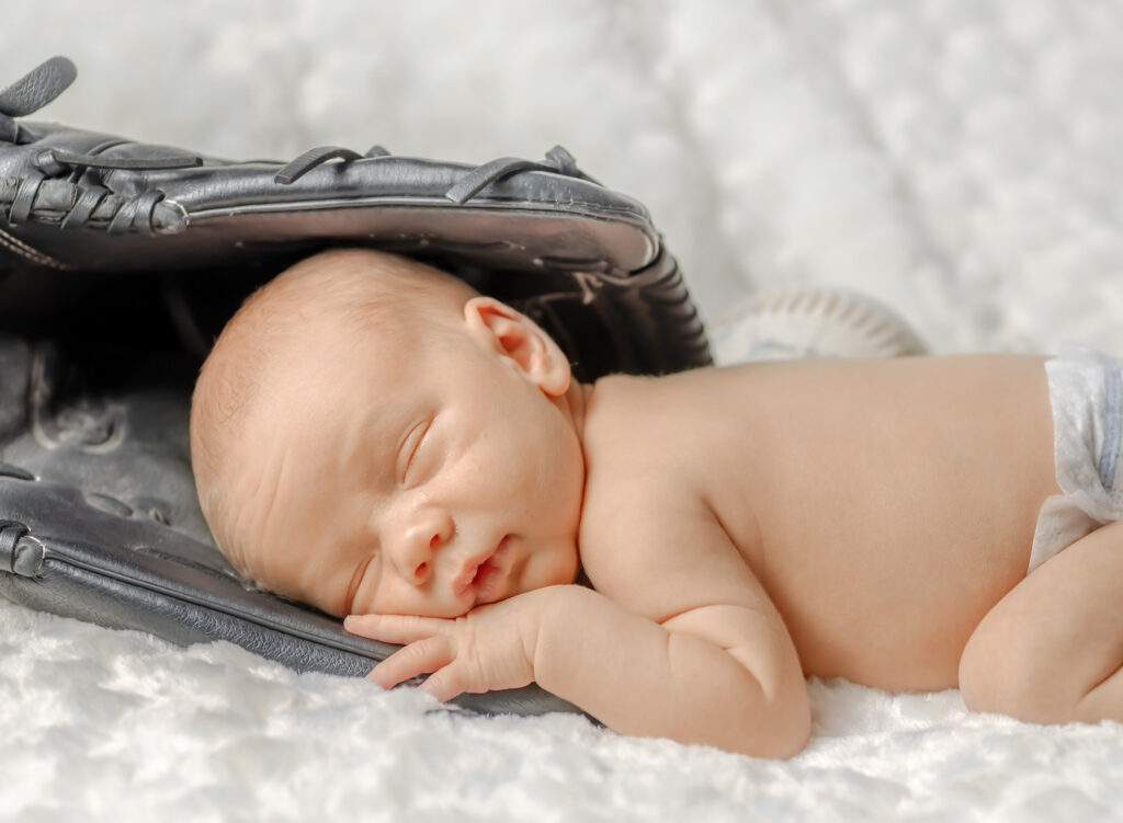 Newborn baby boy posed in studio during St. Catharines newborn photography session